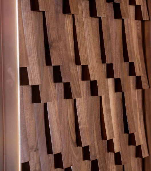 Closeup of entryway wood cladding.