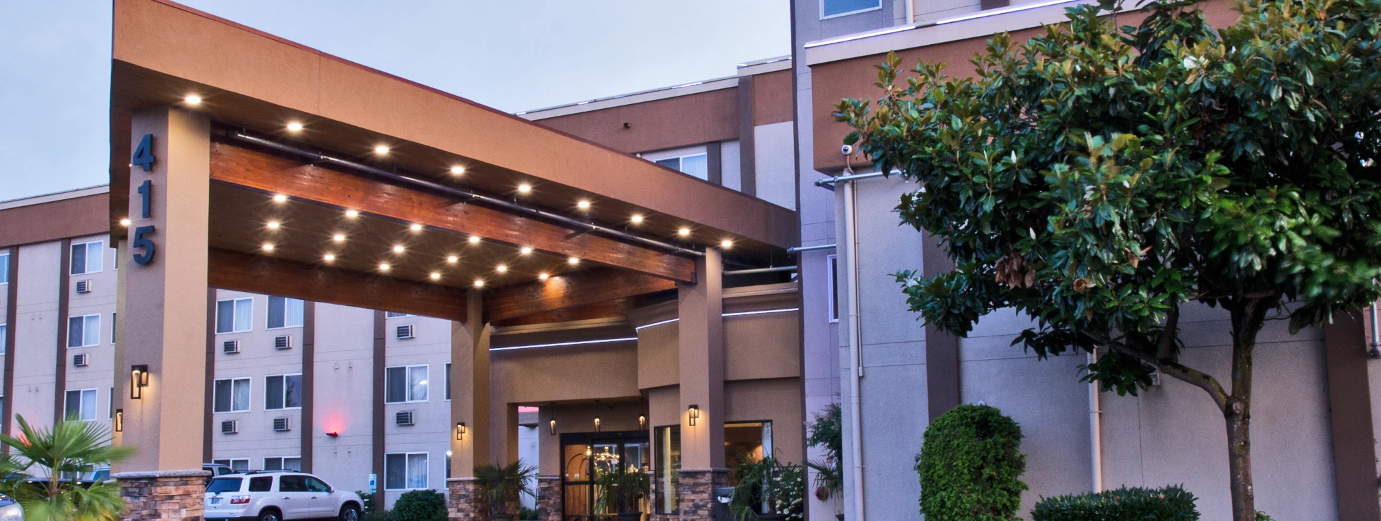 Pacific WA hotel with a new Porte Cochere by Construction Expeditors